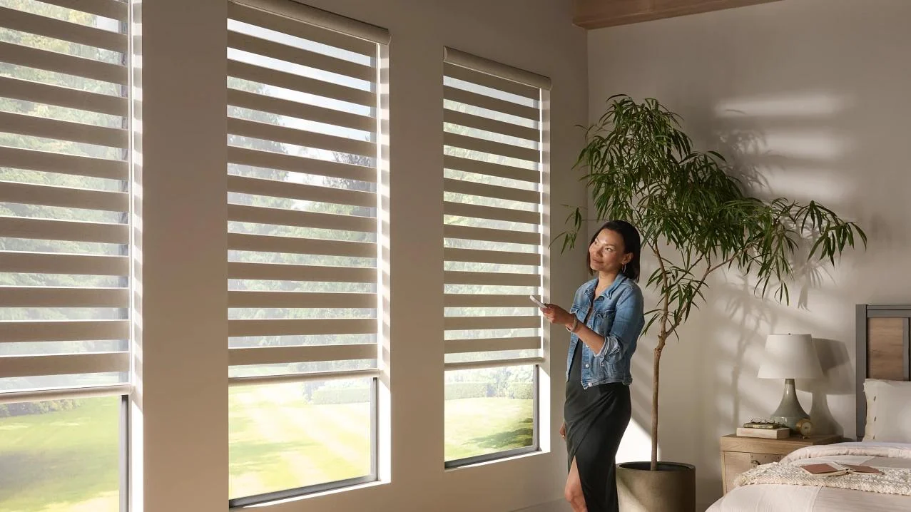 Alta sheer and solid banded fabric at windows.
