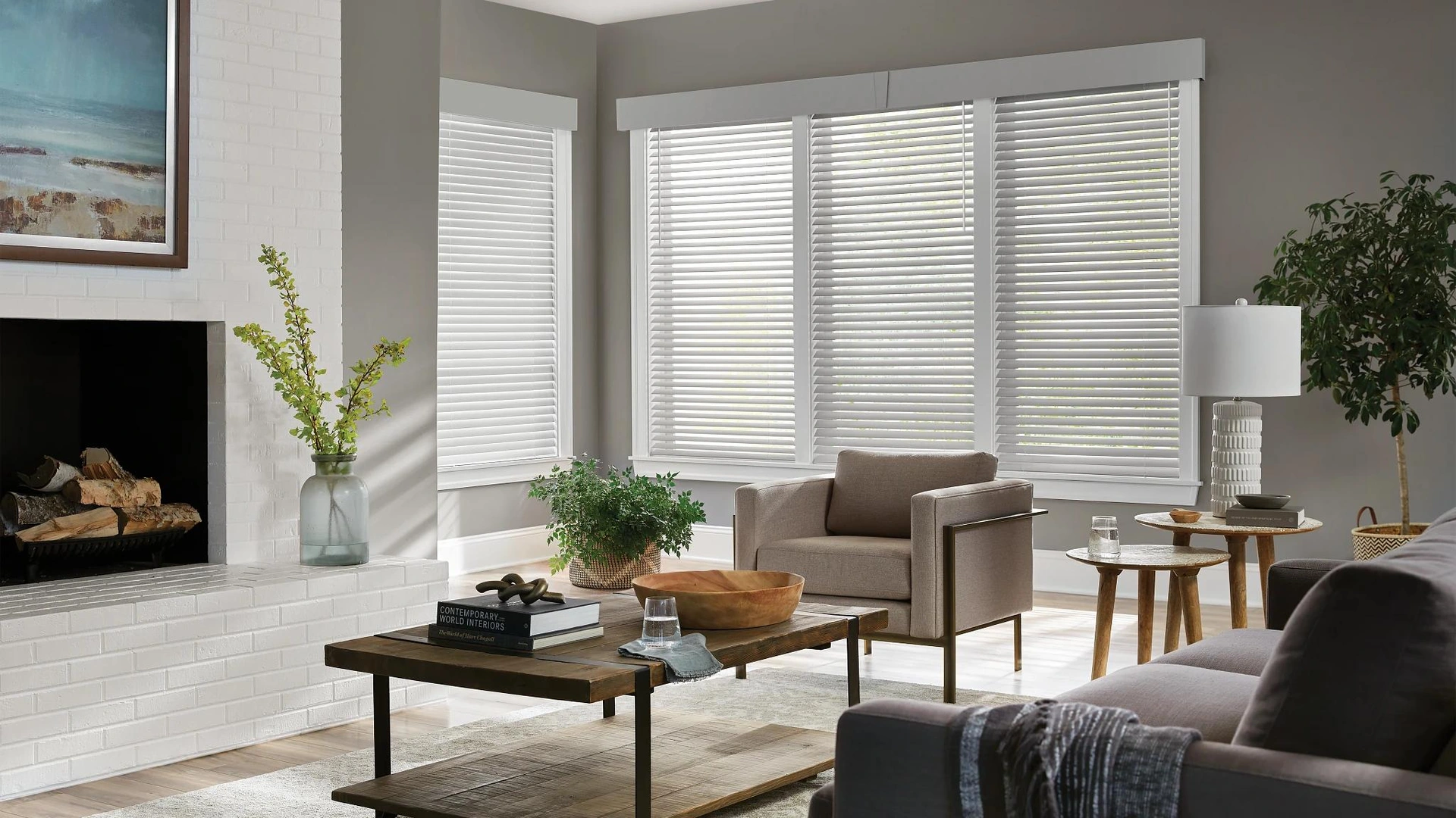 White Alta wood blinds in a light living room.