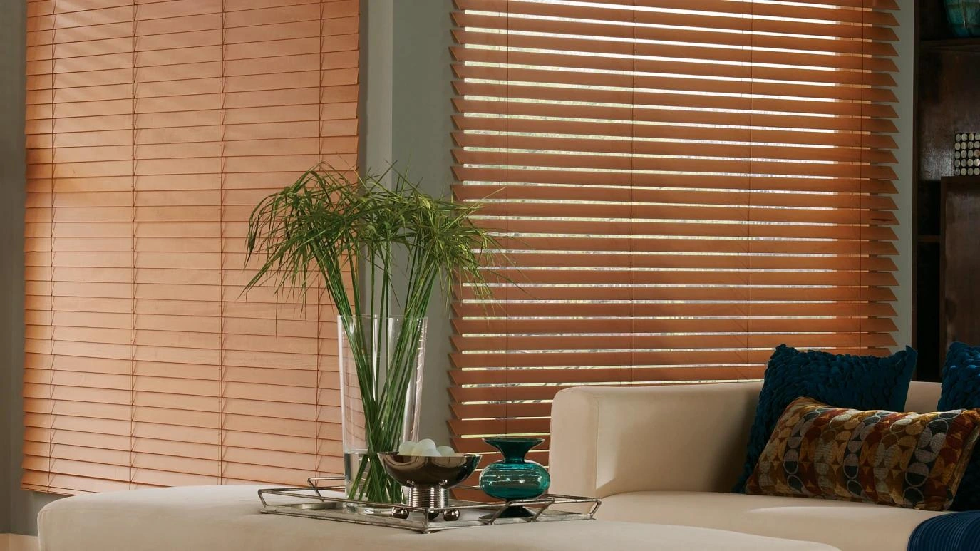 Warm stained Alta wood slats beside timber wall panels.