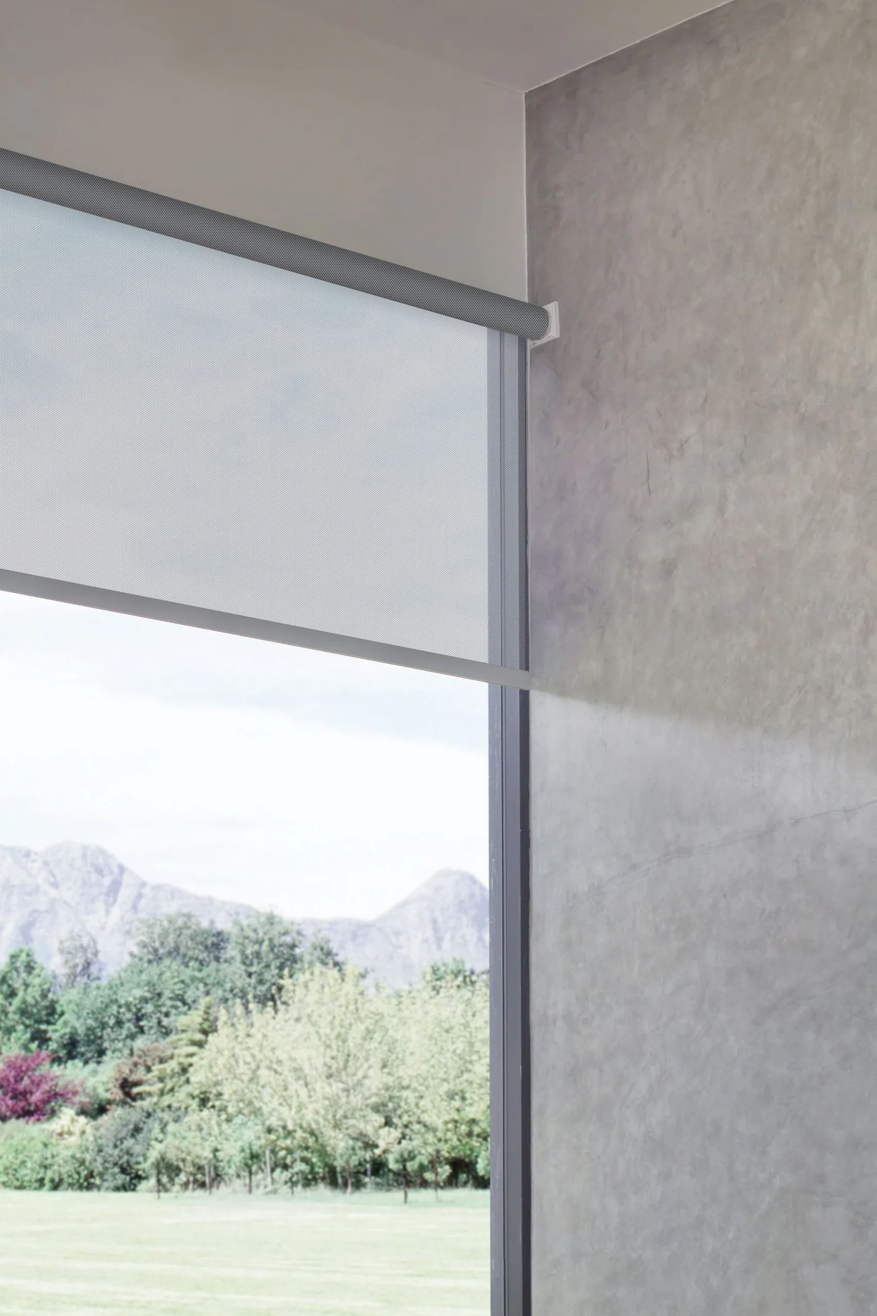 Elite solar roller fabric covering a large window.